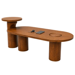 A modern wooden bench with a rounded oval seat, cylindrical legs, a small round side table on the left, and a circular recessed area on the right