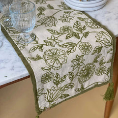 Rosabelle Chintz Olive Table Runner close-up of floral embroidery on marble table