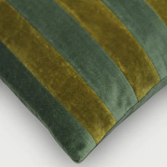 A close-up of a Holly Eucalyptus Velvet Stripe Cushion Cover with alternating vertical stripes of dark forest green and olive green.