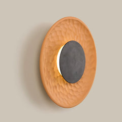 Decorative Round Terra Disc Wall Light made of ceramic handle with a black metallic center