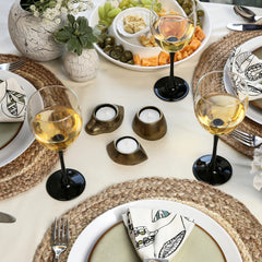 Decorative Three Leshya Tea Light Holders made of Aluminium placed on a table