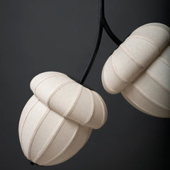 Close-up of a unique pendant light with beige 2 lampshades
