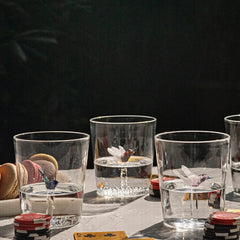 Eileen clear Drinking Glasses with small glass figurines like bird inside the class