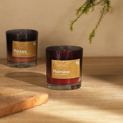 Renew Berries Vegan Scented Candle with Palm wax placed on wooden table