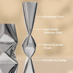 A polished stainless steel sculptural vases with a twisted, hourglass-like form, shown with text callouts reading 'Sculptural Form,' 'High-Grade Stainless Steel,' 'Mirror-Polished Finish,' and 'Durable by Design' on a warm beige background.