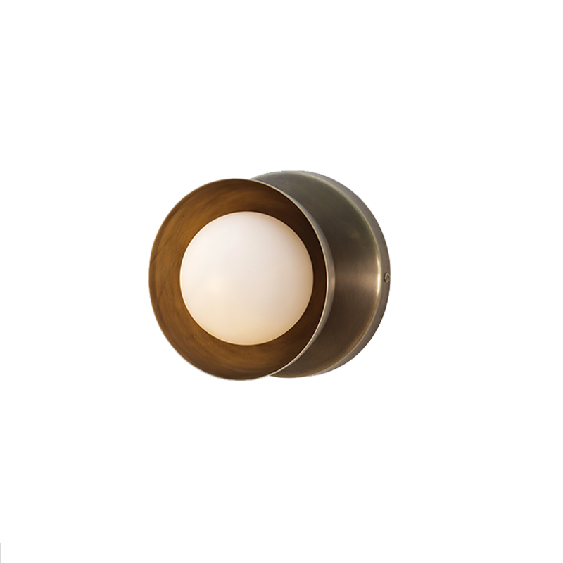 Dew Wall Sconce -Small Brass Dome mounted on wall, ambient warm glow for living room setting