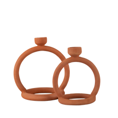 Two terracotta candle stands with earthy and natural tones of the clay 