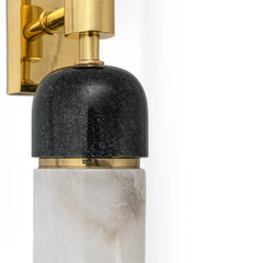 Modern Capsule Wall Light, featuring a sleek cylindrical glass shade and refined brass finish