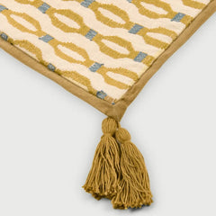 Poppy Ochre Table Runner corner detail with microvelvet flange and tassel
