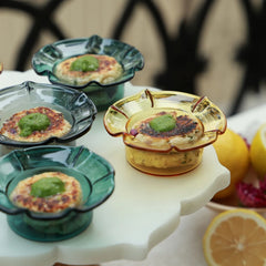 PETAL - Mini Glass Server – teal, clear black and yellow servers with grilled patties and green chutney on a marble cake stand