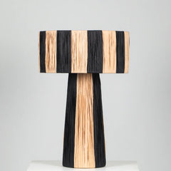Unique Wald Table Lamp with natural texture in black and beige stripes on a gray background