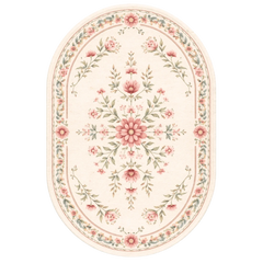 Floral patterned rug with pink flowers and green leaves on a white background