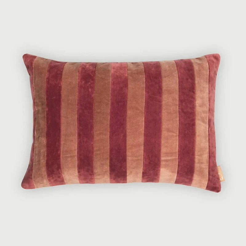 Holly Spice Velvet Stripe Cushion Cover with red and brown horizontal stripes on a light gray background