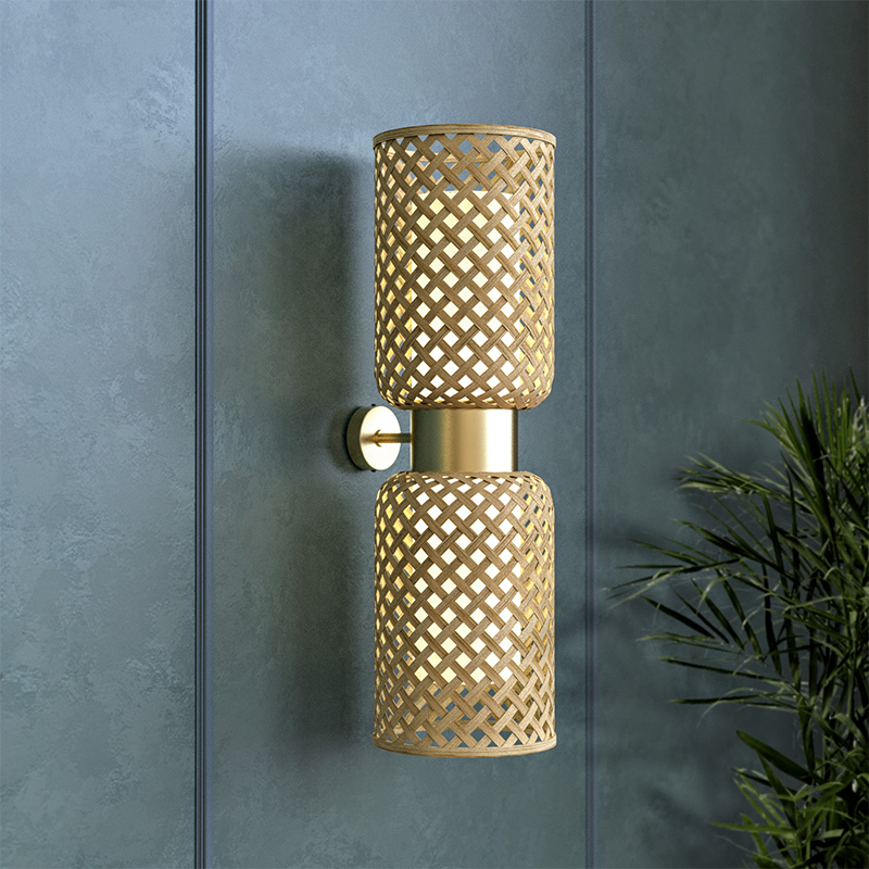 Close-up of Metamorphosis Wall Lamp showing bamboo weave detailing and the warm glow of internal diffuser.