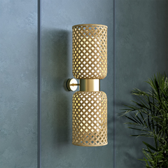 Close-up of Metamorphosis Wall Lamp showing bamboo weave detailing and the warm glow of internal diffuser.
