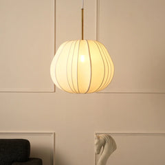 A Berlin Georgette Pendant Lamp with a soft off white fabric shade, hanging from a ceiling mount.