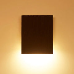 Down Light wall sconce in square shape wall light fixture on a beige wall