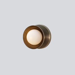 Dew Wall Sconce – handcrafted brass dome backplate and frosted glass diffuser.