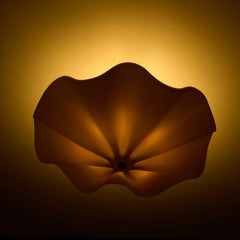 Camellia Ceiling Light lit, angled low view of scalloped ceramic edge