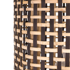 Dawki Floor Lamp close-up of handwoven cane shade texture
with brown and beige strips on a white background