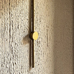 Modern Conical Wall Sconce, featuring Gold plated rod fixture on the wall