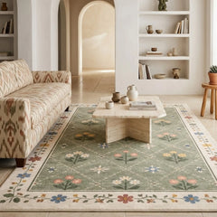Living room with a floral-patterned rug, sofa, and coffee table for ultra modern homes