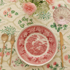 Eden Rose Linen Table Cover with red transferware plate and gold cutlery, top view