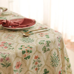 Eden Rose Linen Table Cover draped table corner with napkin and gold cutlery