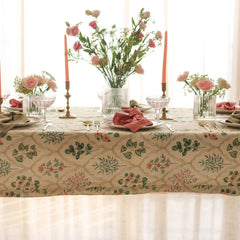 Eden Rose Linen Table Cover on dining table with candles and vases, front view at table height