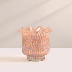 Tuberose & Orchid Votive Candle, peach iridescent lotus-cut glass with ruffled rim, front view