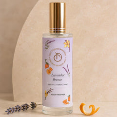 Illume - Room Freshener - 100 ML, Lavender Breeze spray bottle with gold cap, lavender sprig and orange peel