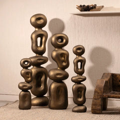 Detail view of the Ren Organic Sculpture's Bronze Gold finish and sculptural curves