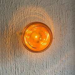 Round amber glass knob design for Spiral glass Wall Light, with warm ambient lighting