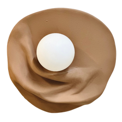 Close view of Folds Wall Sconce Light in Terra Color