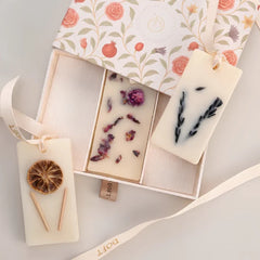 The Signature Trio · Wax Tablet · Flower Blossom, Lemongrass and Lavender, open gift box with orange, rose and lavender tablets