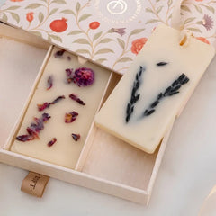 The Signature Trio · Wax Tablet · Flower Blossom, Lemongrass and Lavender, close-up of rose petal and lavender tablets in box