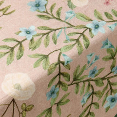 Valley Rose Linen Table Cover close-up of blue flowers and leafy vine print on linen