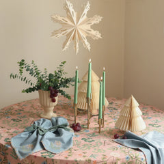Valley Rose Linen Table Cover with green taper candles, paper trees and blue napkins