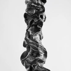Cosmos Totem Floor lamp in black finish showing marbled monochrome texture
