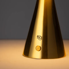 Portable metal chrome table lamp, cone-shaped base with 'fig living' branding.