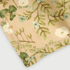 Valley Peach Linen Table Cover close-up of corner hem-stitch and botanical print