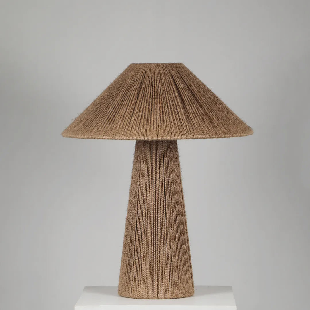 Cello Table Lamp, Woven lamp with a textured design on a gray background