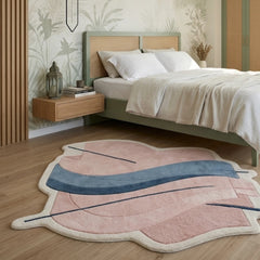 Modern bedroom with a colorful abstract rug on the floor.