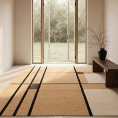 Modern room with a large window, wooden bench, and patterned rug.