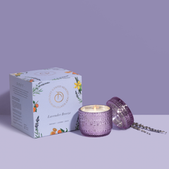 Lavender Breeze Trinket Jar Candle, purple patterned glass jar with lid and Lavender Breeze box on lilac backdrop