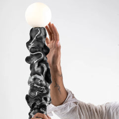 Close look of Cosmos Totem Floor lamp showing spherical decor accessory for reference