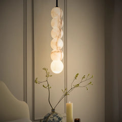 Single Pendant light fixture with spherical bulbs made of alabaster stone