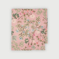 Valley Rose Linen Table Runner folded, showing Himalayan floral print