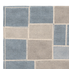Square tiles in blue and gray pattern on a white background