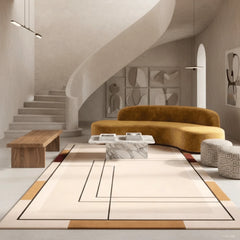 Modern living room with a curved brown sofa, wooden bench, and abstract art on the wall.
